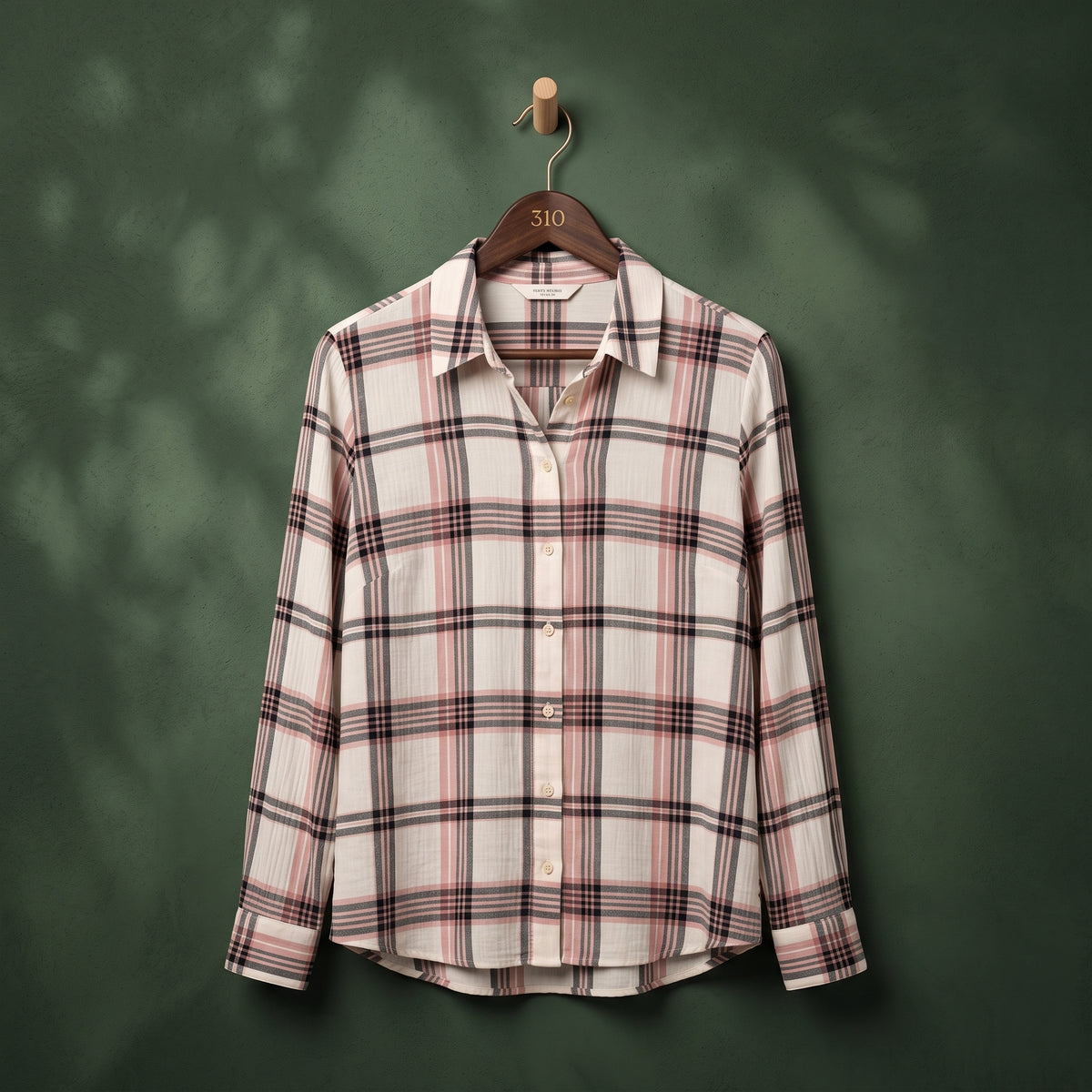 Women's cream plaid shirt with pink, grey and black checks, long sleeves – front view on hanger