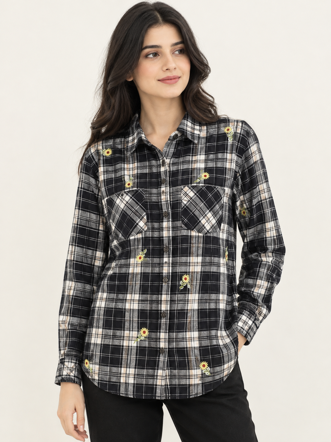 Model wearing women's black and white plaid sunflower embroidered shirt