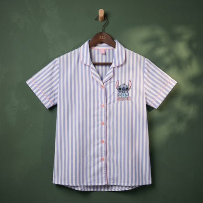 Women's light blue and white striped short-sleeve button-up shirt with Stitch graphic – front view